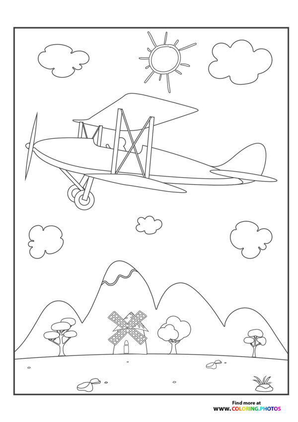 Biplane over the meadow