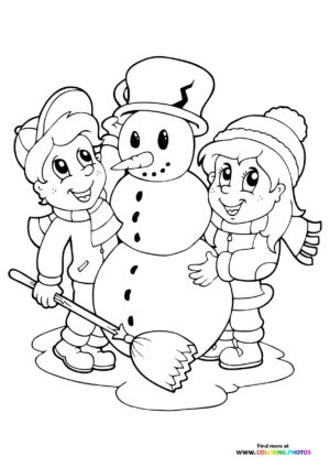 Boy and girl build a snowman