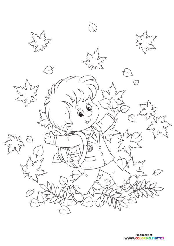 Kid Playing in Autumn Leaves