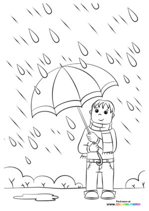 Boy in autumn rain