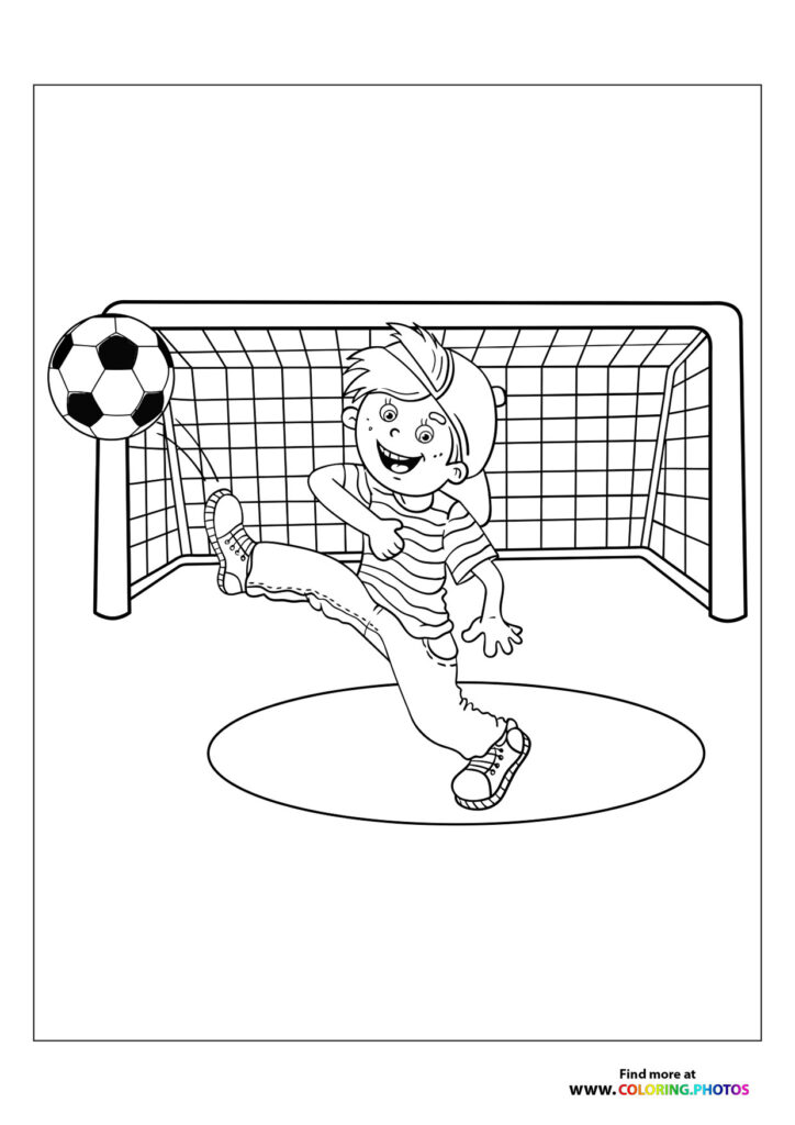Boy in soccer goal