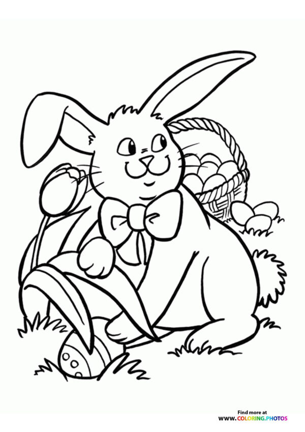 Easter bunny hiding eggs coloring page