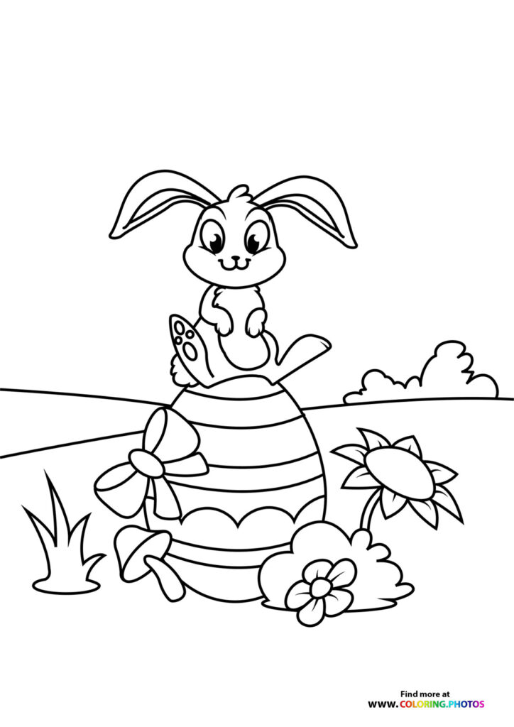 Easter bunny on an egg coloring page
