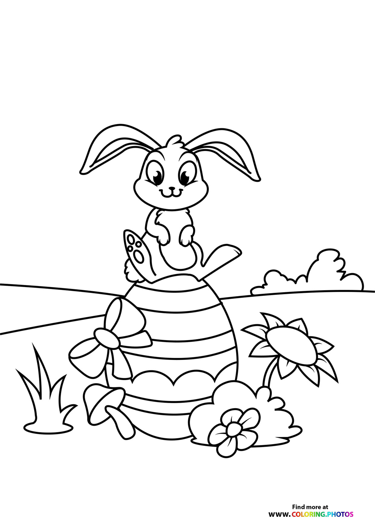 Easter bunny on an egg coloring page