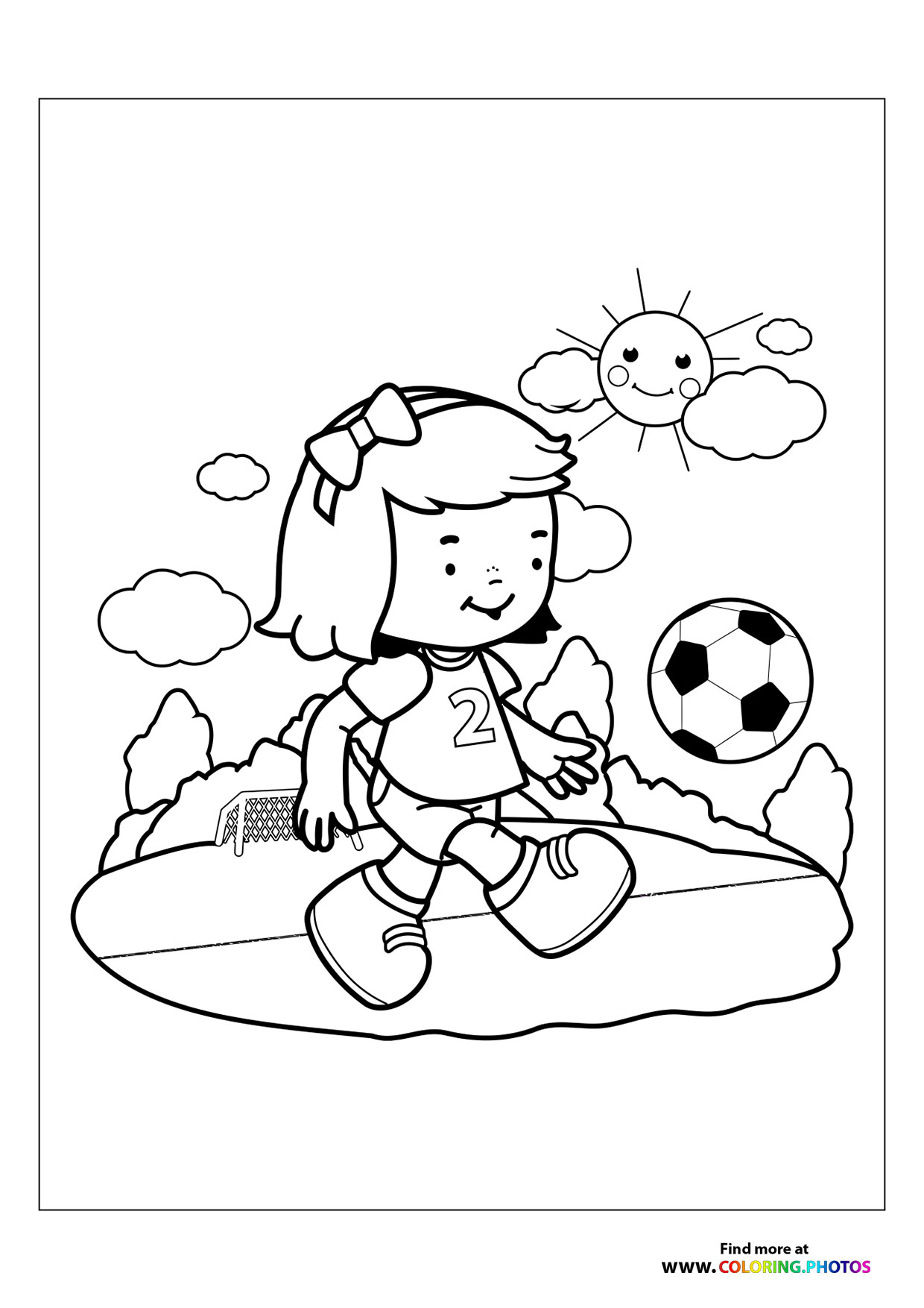 Girl kicking soccer ball