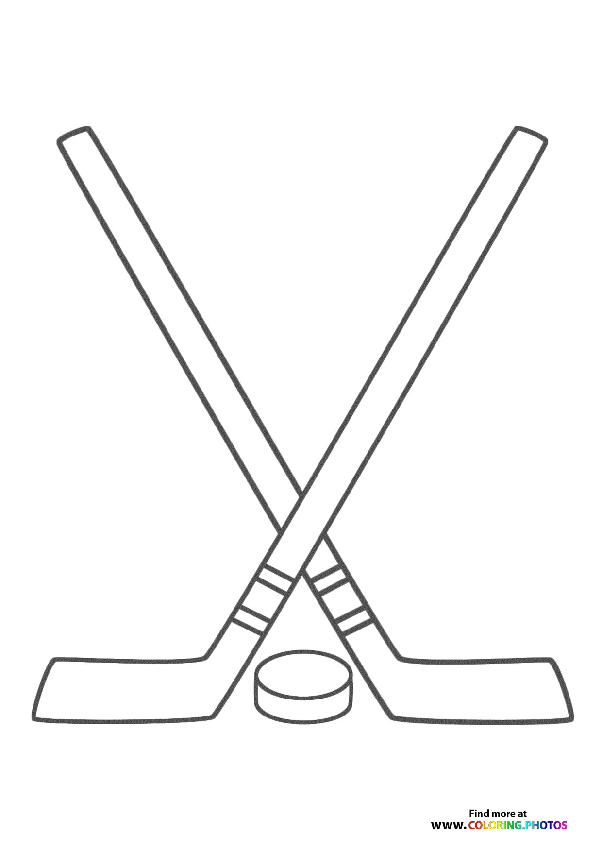 Ice hockey sticks and puck