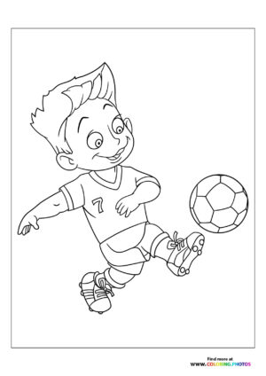 Little boy kicking the football