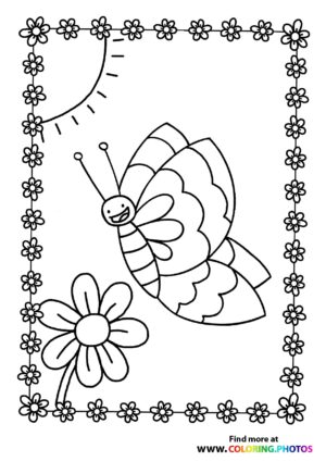 Butterfly flying to a flower